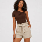 Apricot paperbag-waist shorts close view