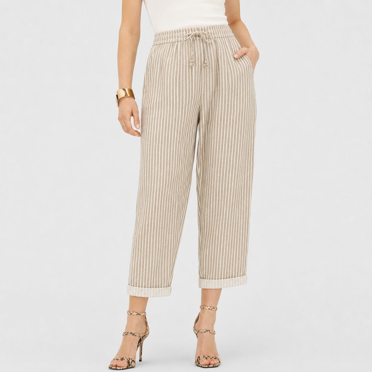Apricot striped drawstring cropped trousers close view
