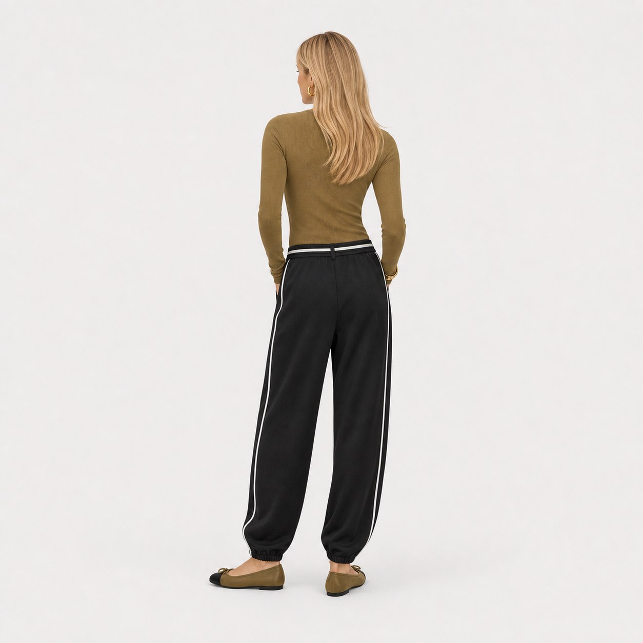 Women's black relaxed trousers back view