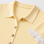 Pale yellow ribbed knit dress collar and button detail
