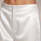 White satin wide-leg trousers detail view