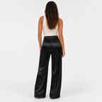 Black satin wide-leg trousers back view