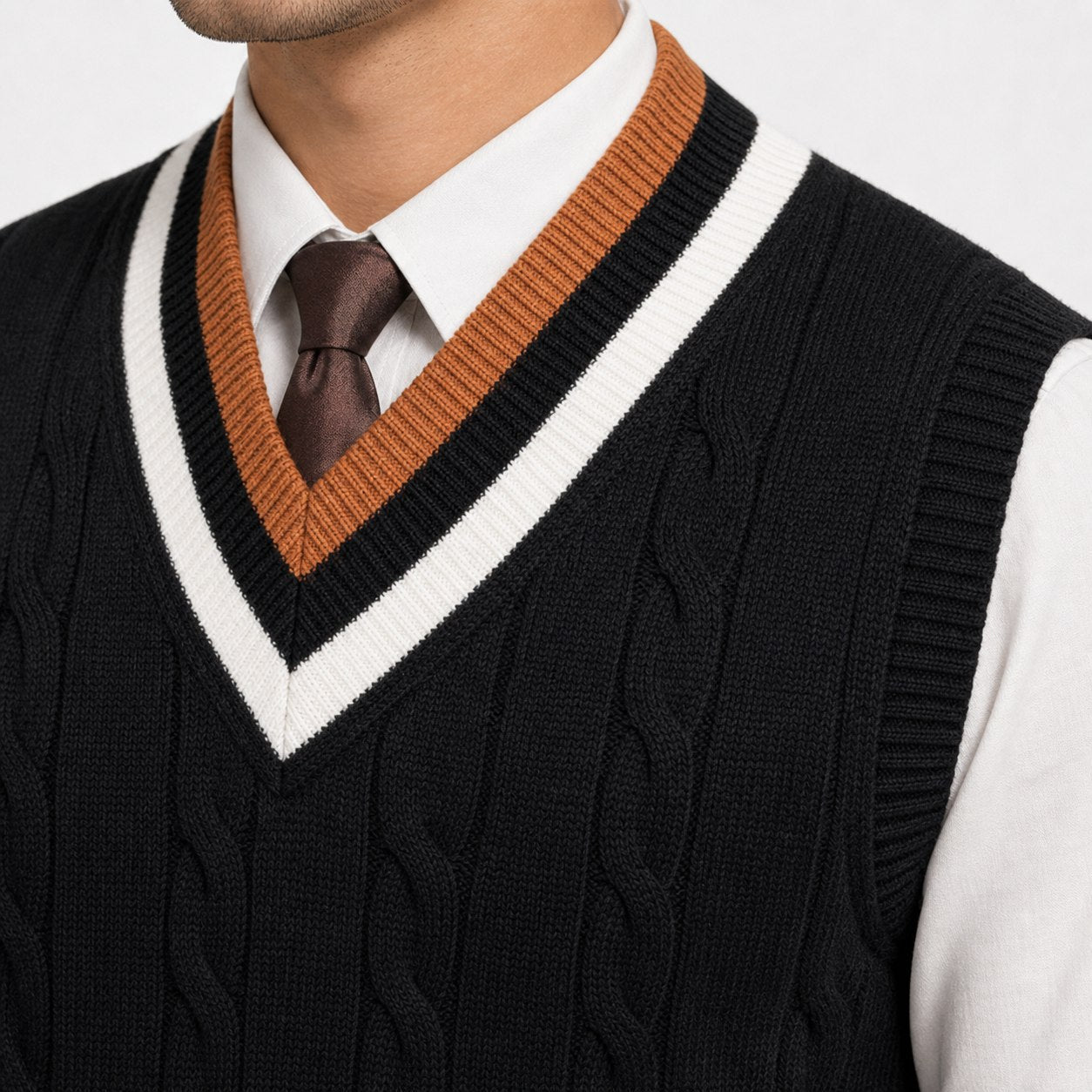 Men's cable-knit V-neck sweater vest in Black knit detail