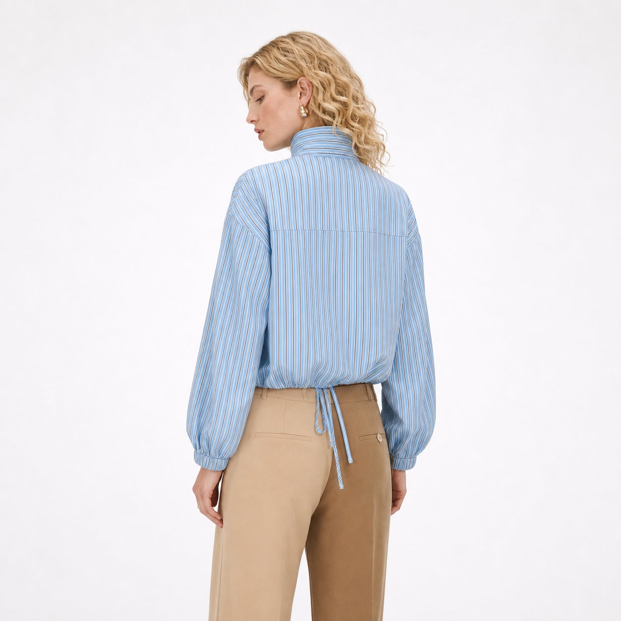 Women's blue striped high-collar top back view