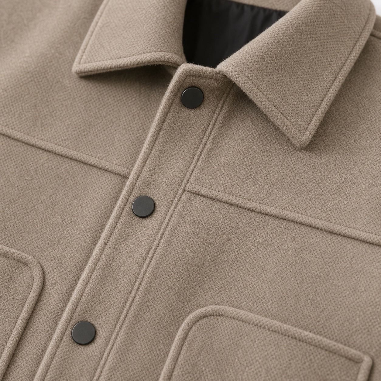 Khaki men's wool jacket fabric and pocket detail