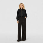 Women’s collared zip cape blouse in Black, second front model view