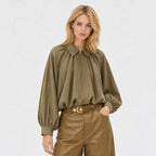 Women’s collared zip cape blouse in Green, front model view
