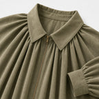 Women’s collared zip cape blouse in Green, collar and zipper detail
