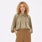 Women’s collared zip cape blouse in Khaki, front model view