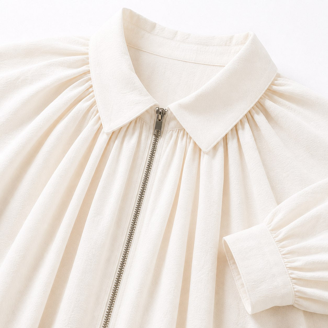 Women’s collared zip cape blouse in Milky White, collar and zipper detail