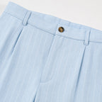 Men's light blue pinstripe pleated trousers waistband detail