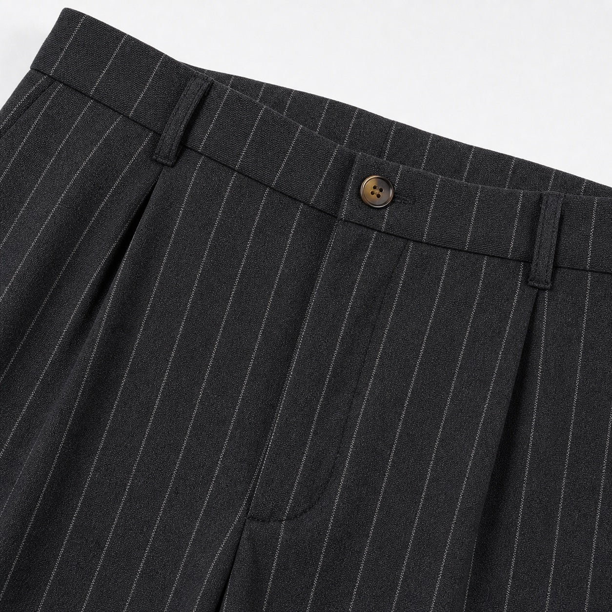 Men's black pinstripe pleated trousers waistband detail