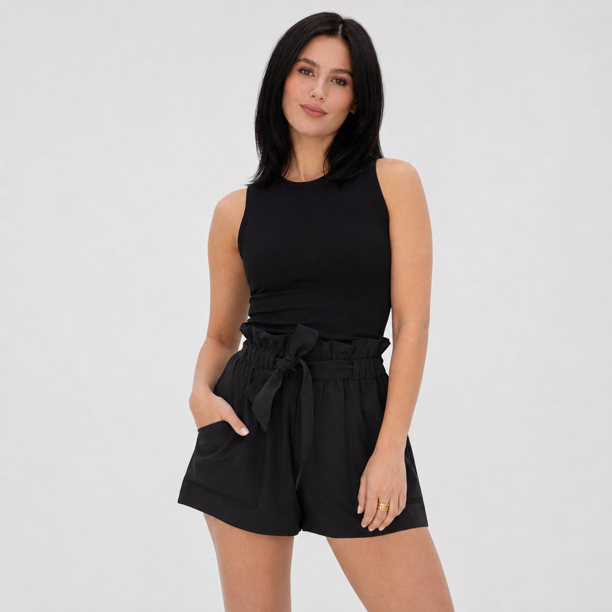 Black paperbag-waist shorts close view