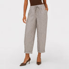 Brown striped drawstring cropped trousers close view