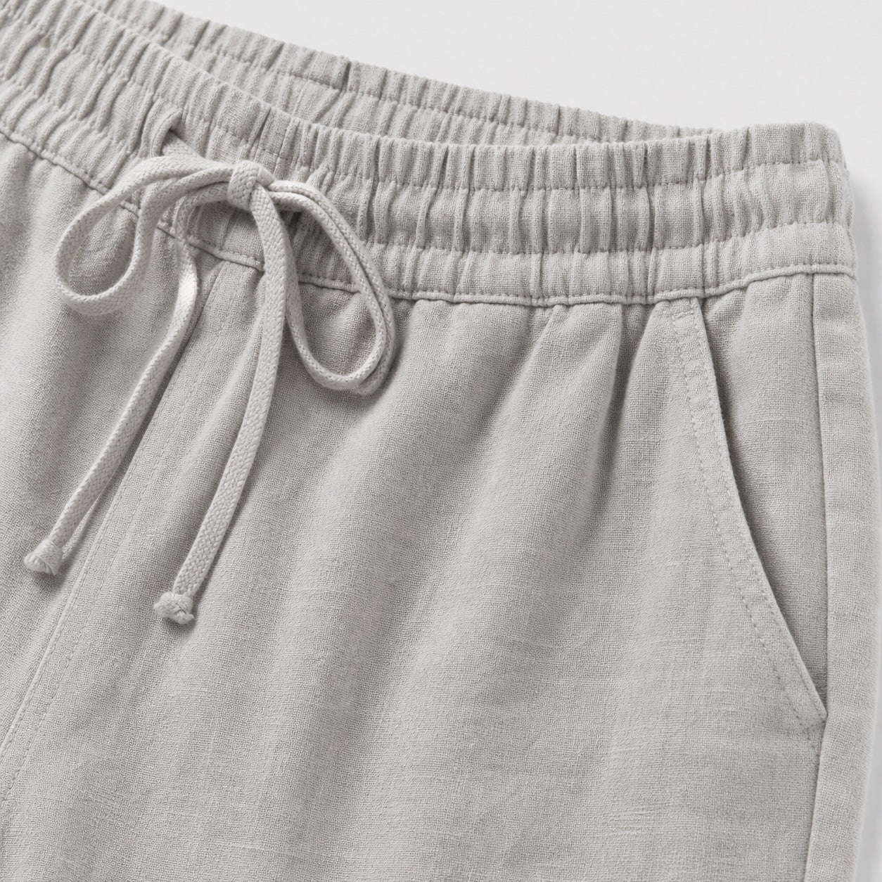 Grey linen-look drawstring trousers detail