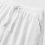 White linen-look drawstring trousers detail